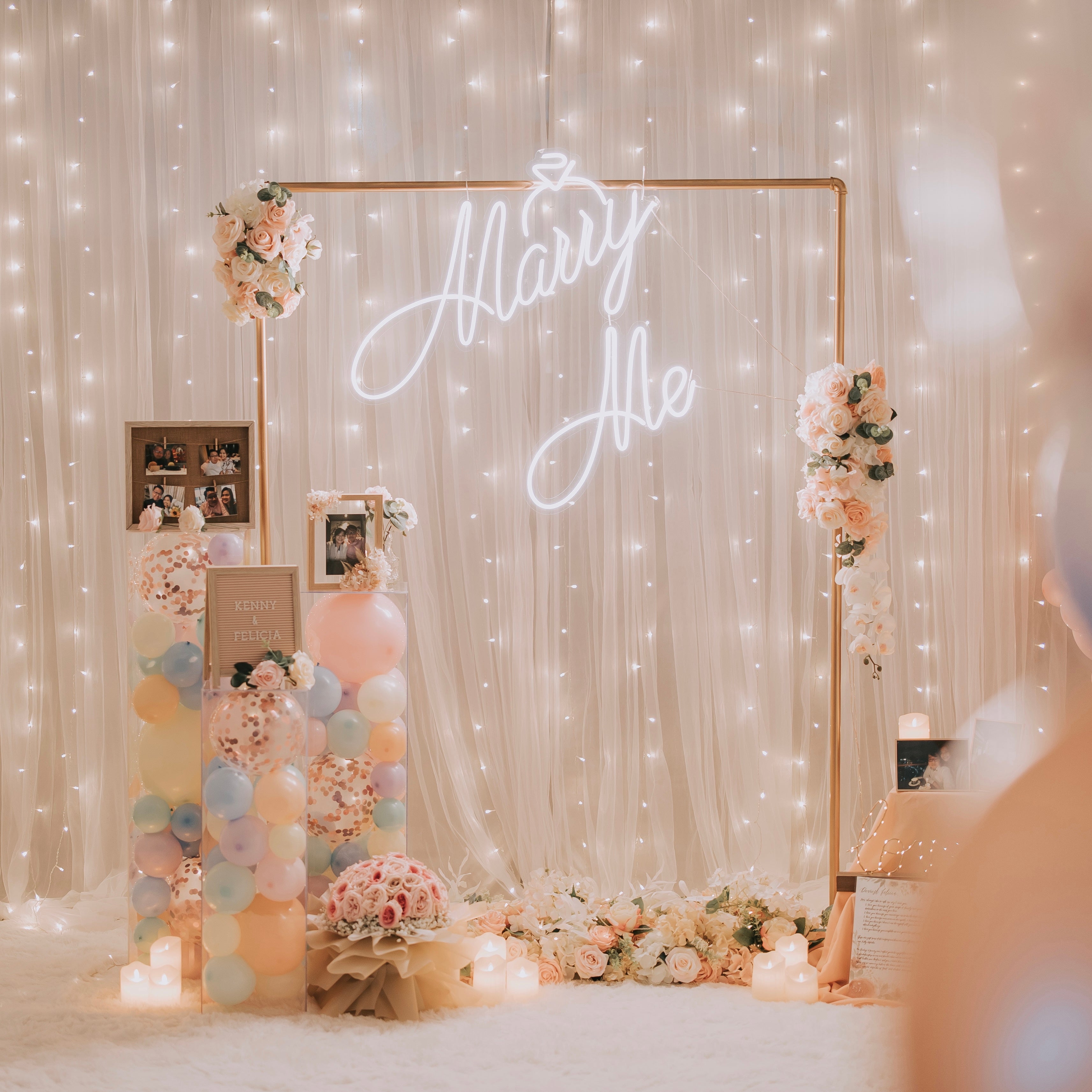 Romantic Hotel Room Proposal Decor in Singapore with Fairylight Backdrop, Pastel Balloons, Flowers and Neon Sign by Style It Simply