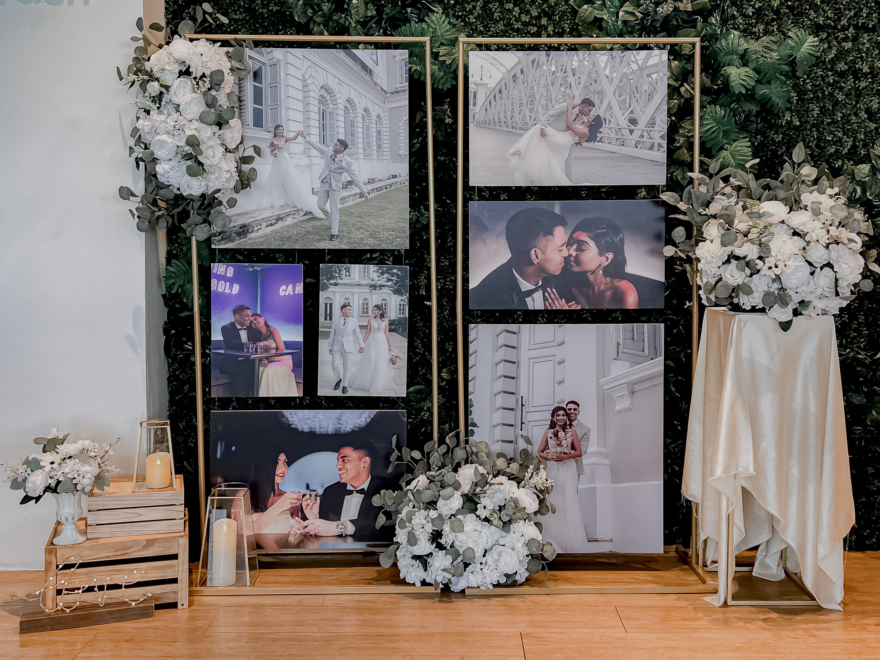 Wedding Reception Decor in Singapore - Multi-stands Photo Gallery with White Florals (Venue: Sky Garden Sentosa)