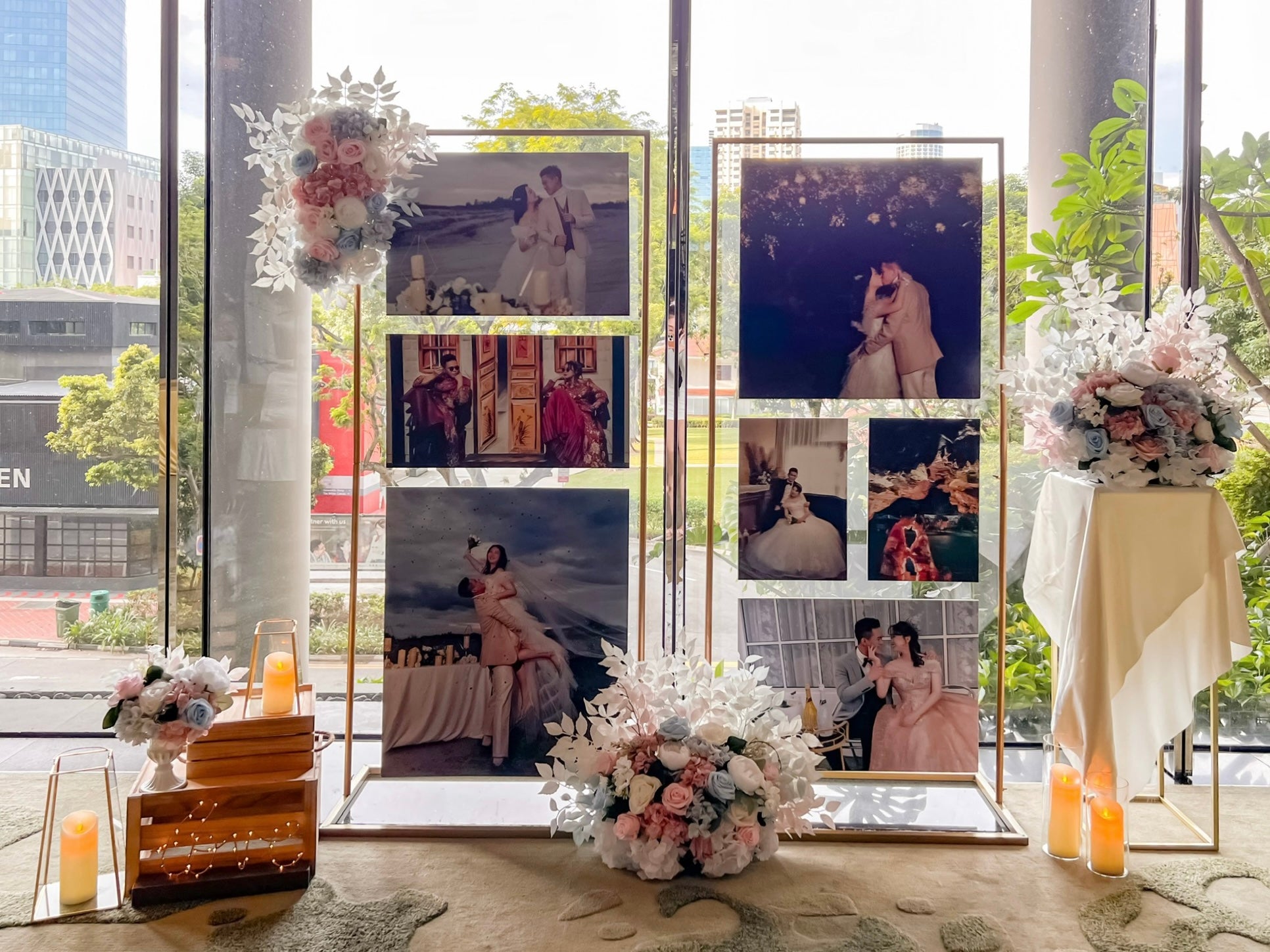 Wedding Reception Decor in Singapore - Multi-stands Photo Gallery with Blue Pink White Florals (Venue: Parkroyal Collection Pickering)