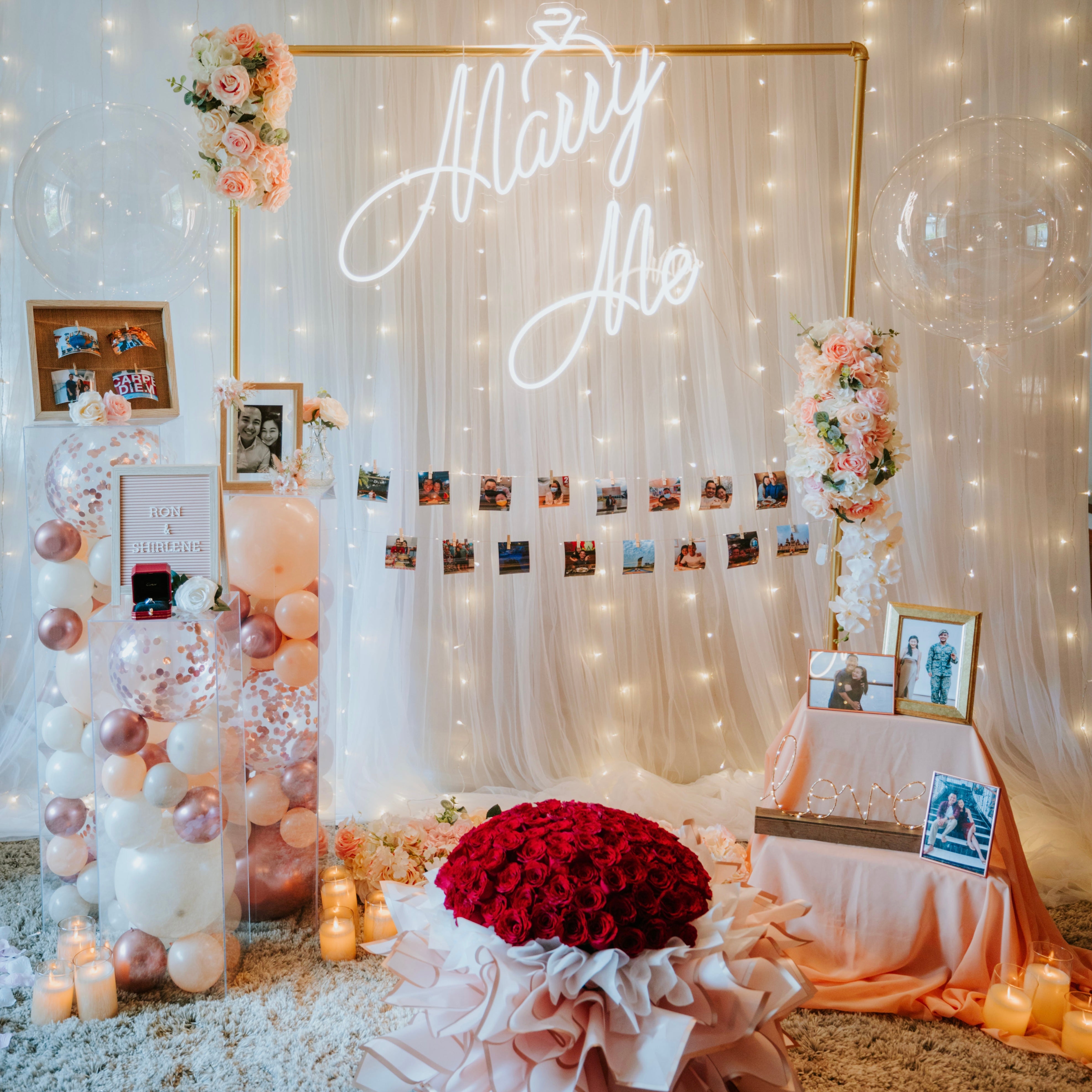 Romantic Hotel Room Proposal Decor in Sofitel Singapore Sentosa with Fairylight Backdrop, Pastel Balloons, Flowers and Neon Sign by Style It Simply