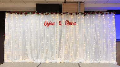 Wedding Stage Decor in Singapore - 6m White Backdrop with Fairylights & Red Floral Veins & Custom Name Banner