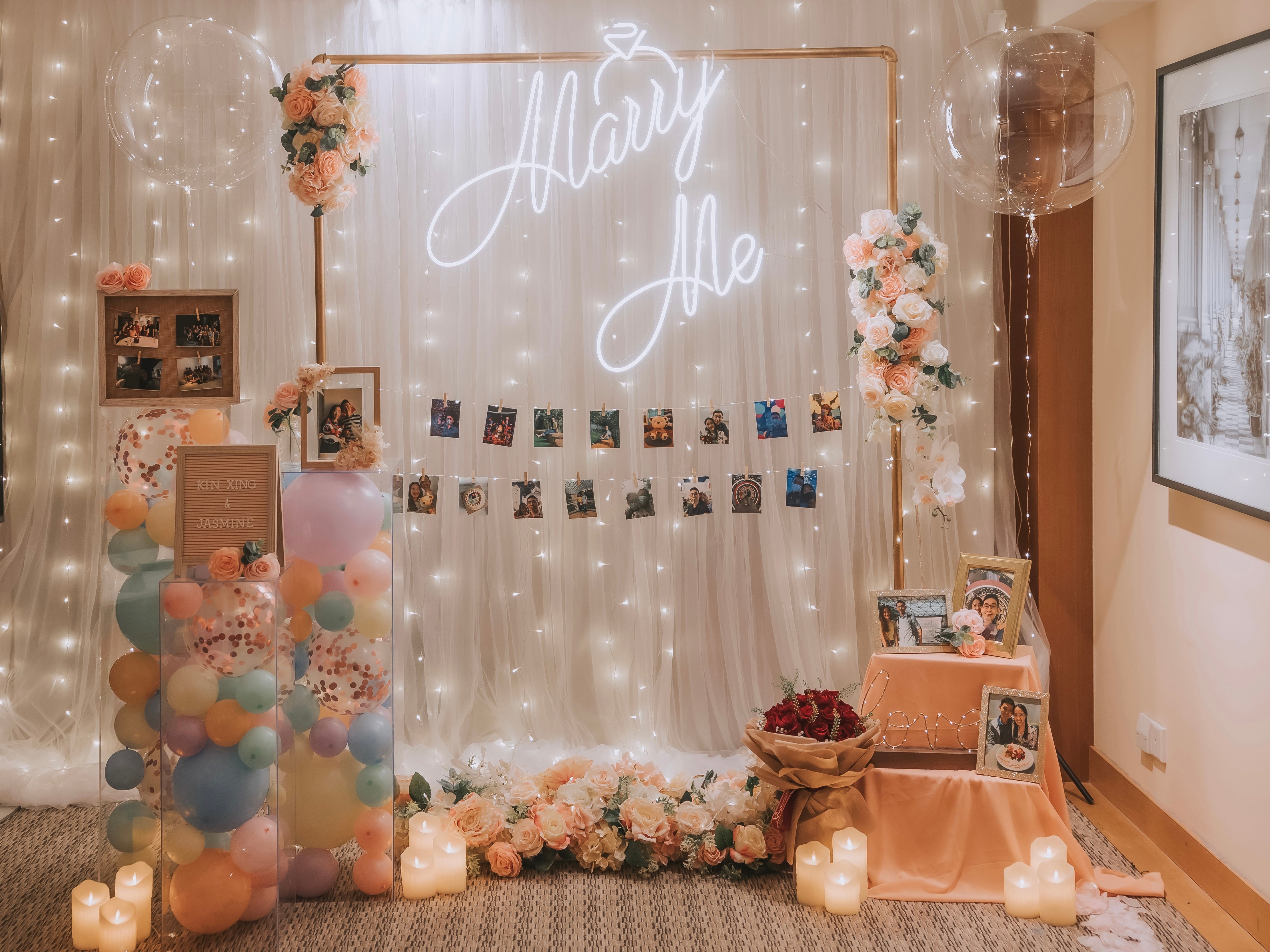 Romantic Hotel Room Proposal Decor in Grand Hyatt Singapore with Fairylight Backdrop, Pastel Balloons, Flowers and Neon Sign by Style It Simply