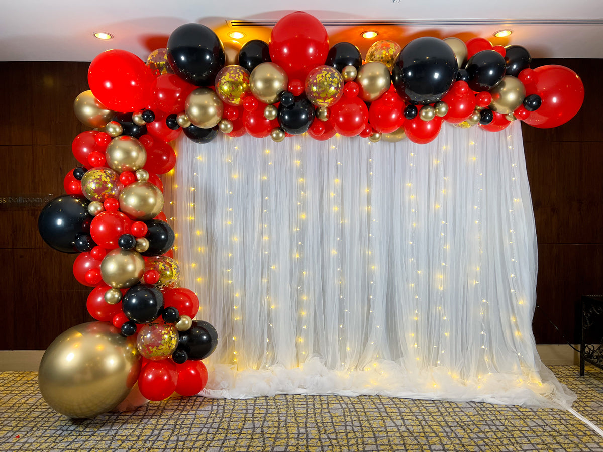 XL Signature Balloon Garland on Curtain Backdrop – Style It Simply