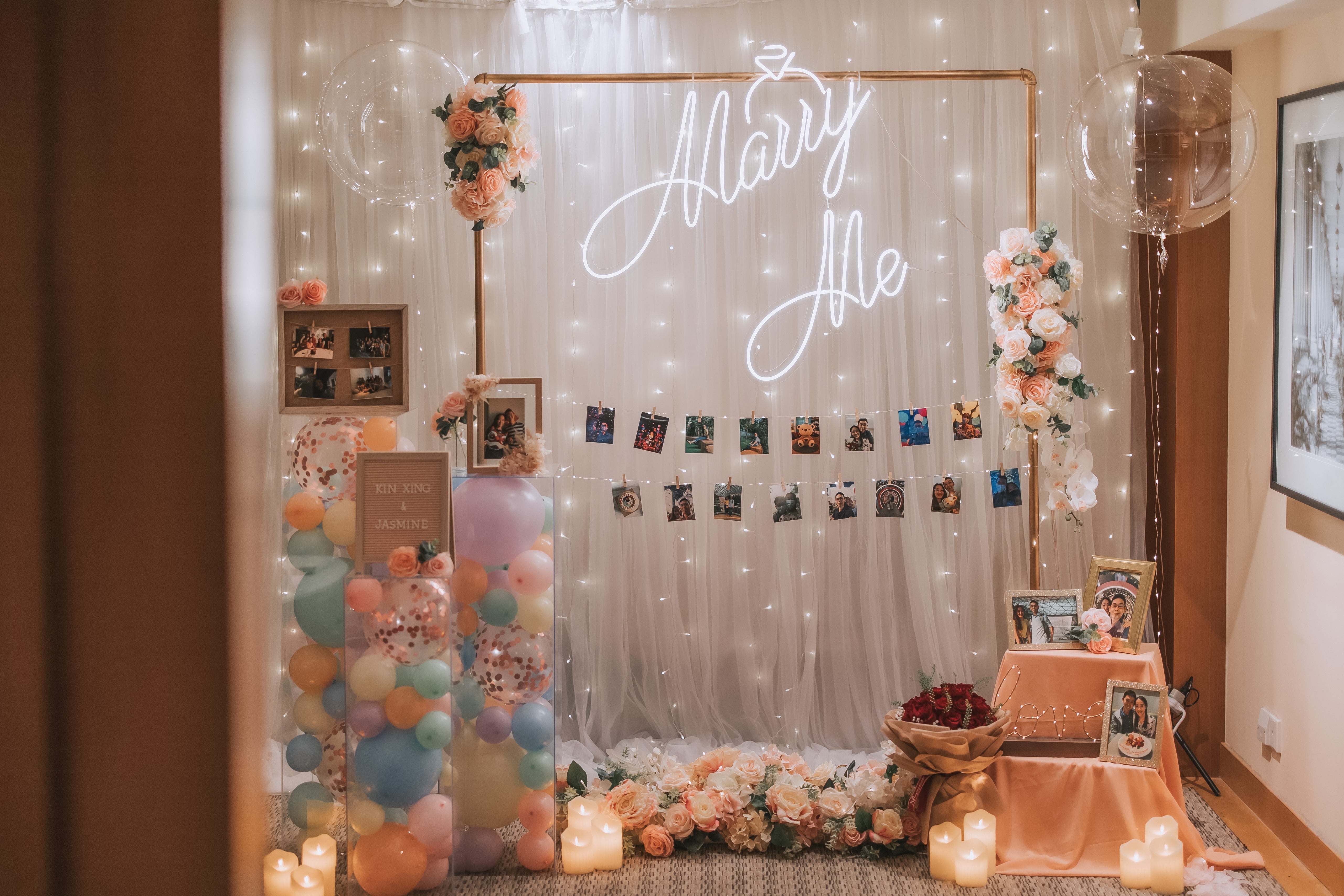 Romantic Hotel Room Proposal Decor in Grand Hyatt Singapore with Fairylight Backdrop, Pastel Balloons, Flowers and Neon Sign by Style It Simply
