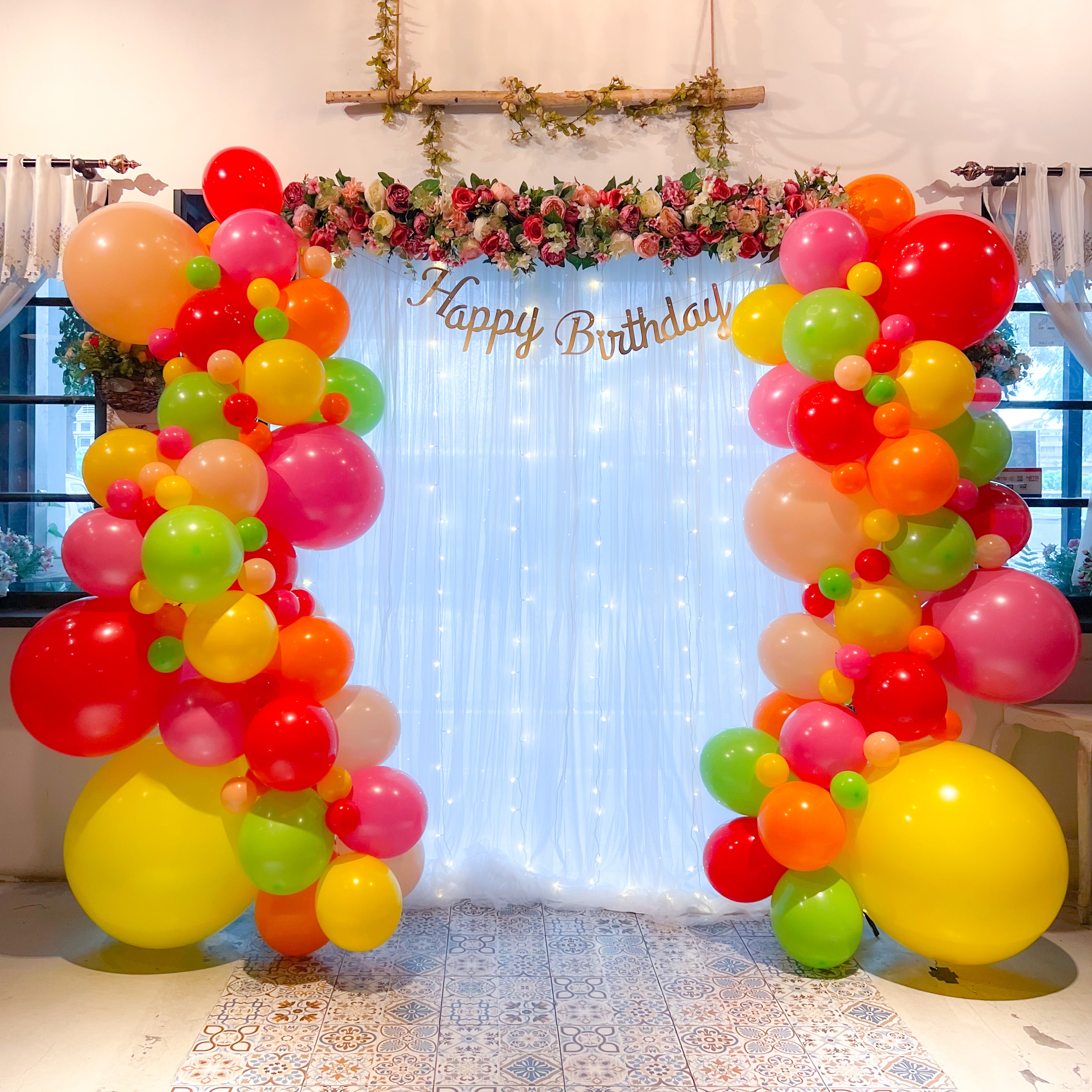 Floral + Balloon Garland on Curtain Backdrop