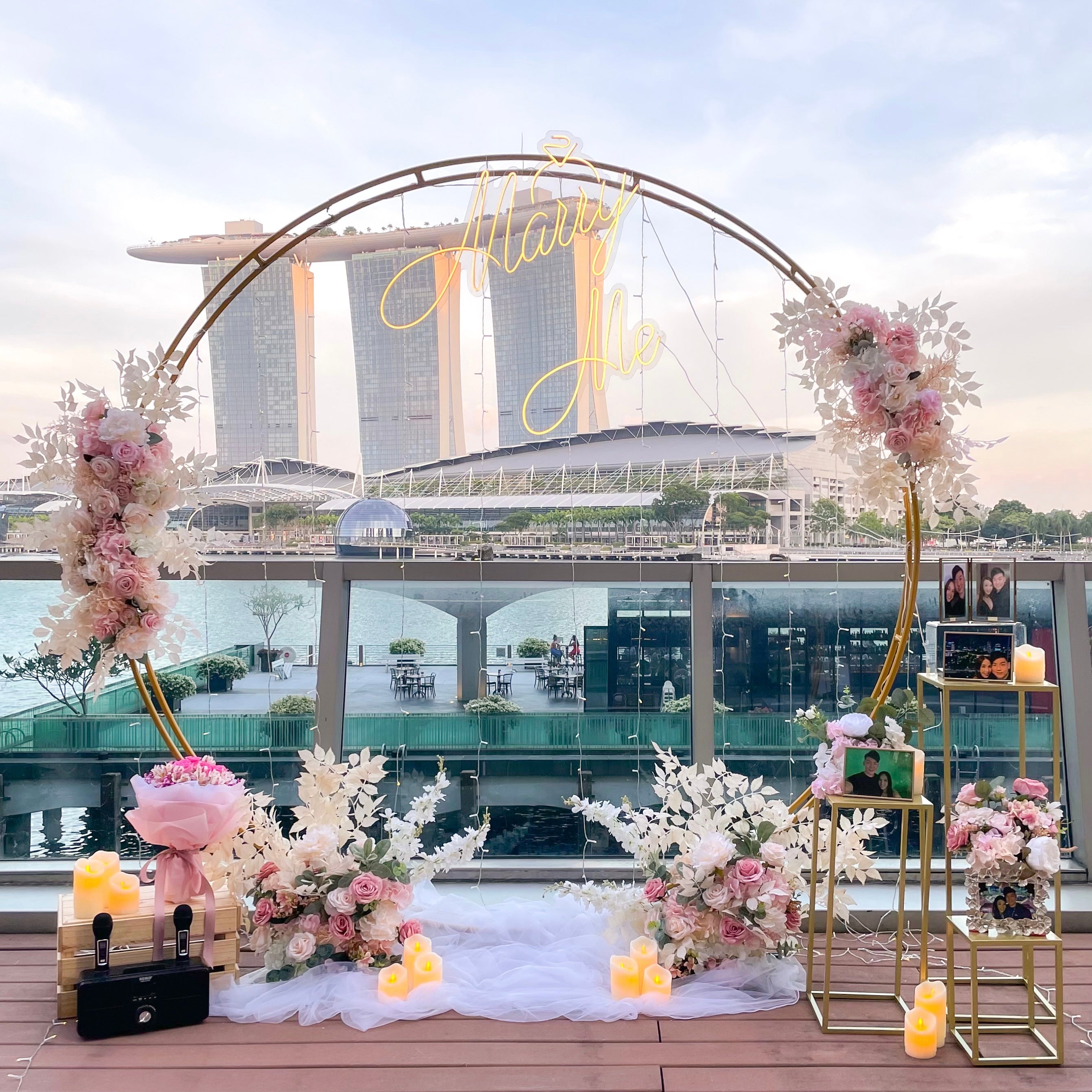 Romantic Outdoor Proposal Decor at Custom House in Singapore with Floral Arch, Fairylights and Neon Sign by Style It Simply